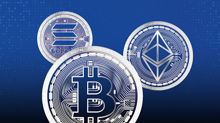 Three digital coins displaying the logos of Bitcoin, Ethereum and Solana on a blue background with circuit-like patterns.